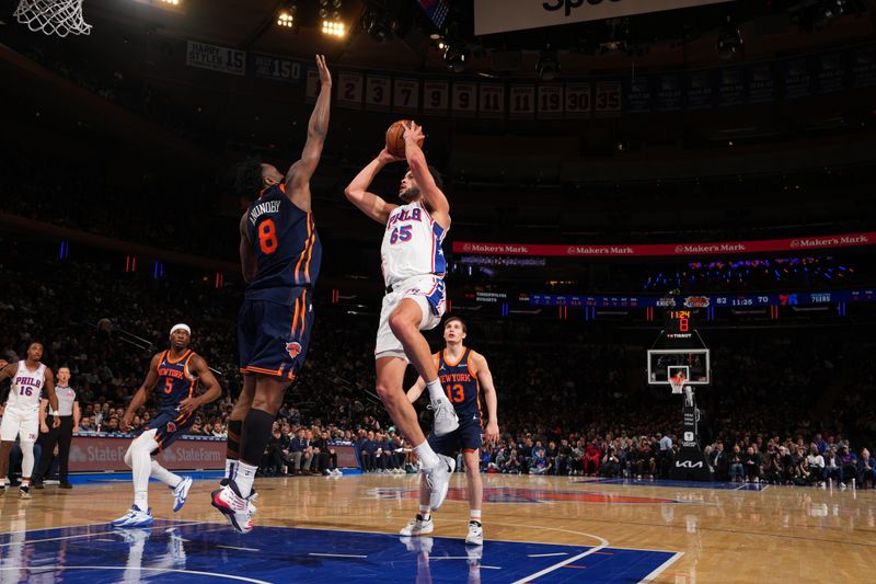 NEW YORK, NY - APRIL 1: Alex Reese #65 of the Philadelphia 76ers drives to the basket during the game against the New York Knicks on April 1, 2025 at Madison Square Garden in New York City, New York.  NOTE TO USER: User expressly acknowledges and agrees that, by downloading and or using this photograph, User is consenting to the terms and conditions of the Getty Images License Agreement. Mandatory Copyright Notice: Copyright 2025 NBAE  (Photo by Jesse D. Garrabrant/NBAE via Getty Images)