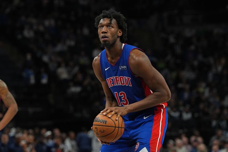 MINNEAPOLIS, MN -  MARCH 27: James Wiseman #13 of the Detroit Pistons shoots a free throw during the game against the Detroit Pistons  on March 27, 2024 at Target Center in Minneapolis, Minnesota. NOTE TO USER: User expressly acknowledges and agrees that, by downloading and or using this Photograph, user is consenting to the terms and conditions of the Getty Images License Agreement. Mandatory Copyright Notice: Copyright 2024 NBAE (Photo by Jordan Johnson/NBAE via Getty Images)