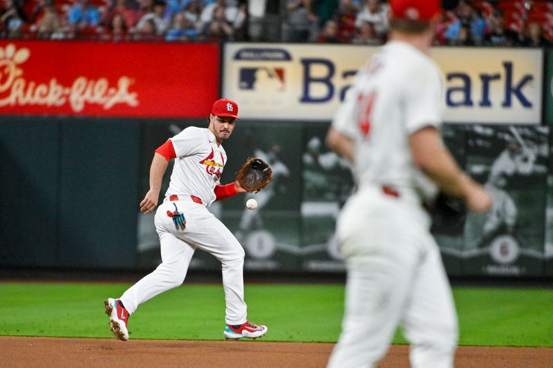 May 3, 2024; St. Louis, Missouri, USA;  St. Louis Cardinals third baseman Nolan Arenado (28) fields a ground ball against the Chicago White Sox during the seventh inning at Busch Stadium. Mandatory Credit: Jeff Curry-USA TODAY Sports