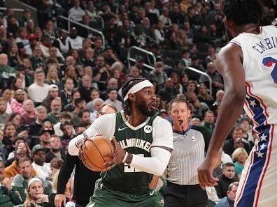 MILWAUKEE, WI - OCTOBER 26: Jae Crowder #99 of the Milwaukee Bucks looks to pass the ball during the game against the Philadelphia 76ers on October 26, 2023 at the Fiserv Forum Center in Milwaukee, Wisconsin. NOTE TO USER: User expressly acknowledges and agrees that, by downloading and or using this Photograph, user is consenting to the terms and conditions of the Getty Images License Agreement. Mandatory Copyright Notice: Copyright 2023 NBAE (Photo by Gary Dineen/NBAE via Getty Images).