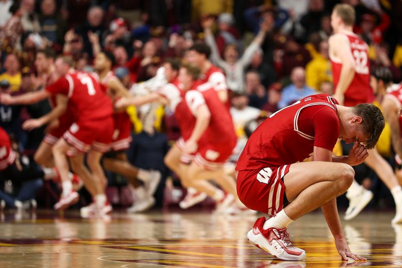 Jan 13, 2026; Minneapolis, Minnesota, USA; Wisconsin Badgers forward Nolan Winter (31) reacts to his teams win against the Minnesota Golden Gophers during the second half at Williams Arena. Mandatory Credit: Matt Krohn-Imagn Images