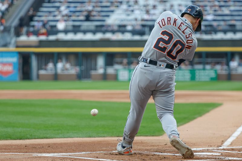 Sep 2, 2023; Chicago, Illinois, USA; Detroit Tigers first baseman Spencer Torkelson (20) singles against the Chicago White Sox during the first inning at Guaranteed Rate Field. Mandatory Credit: Kamil Krzaczynski-USA TODAY Sports