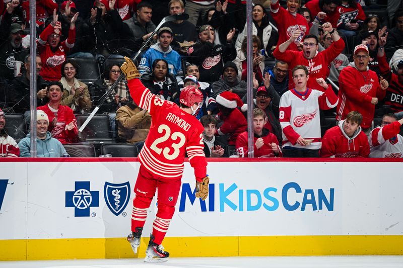 Dec 21, 2025; Detroit, Michigan, USA; Detroit Red Wings left wing Lucas Raymond (23) celebrates his goal during the second period against the Washington Capitals at Little Caesars Arena. Mandatory Credit: Tim Fuller-Imagn Images