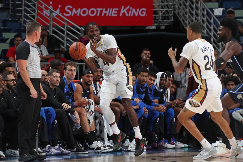 NEW ORLEANS, LA - OCTOBER 7: Javonte Green #24 of the New Orleans Pelicans passes the ball during the game against the Orlando Magic on October 7, 2024 at the Smoothie King Center in New Orleans, Louisiana. NOTE TO USER: User expressly acknowledges and agrees that, by downloading and or using this Photograph, user is consenting to the terms and conditions of the Getty Images License Agreement. Mandatory Copyright Notice: Copyright 2024 NBAE (Photo by Layne Murdoch Jr./NBAE via Getty Images)