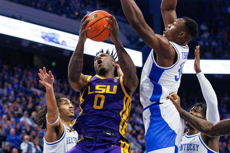 Jan 3, 2023; Lexington, Kentucky, USA; LSU Tigers guard Trae Hannibal (0) goes to the basket during the first half against the Kentucky Wildcats at Rupp Arena at Central Bank Center. Mandatory Credit: Jordan Prather-USA TODAY Sports