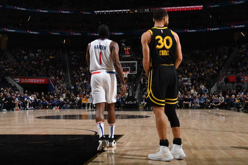 SAN FRANCISCO, CA - FEBRUARY 14: James Harden #1 of the LA Clippers and Stephen Curry #30 of the Golden State Warriors look on during the game on FEBRUARY 14, 2024 at Chase Center in San Francisco, California. NOTE TO USER: User expressly acknowledges and agrees that, by downloading and or using this photograph, user is consenting to the terms and conditions of Getty Images License Agreement. Mandatory Copyright Notice: Copyright 2024 NBAE (Photo by Noah Graham/NBAE via Getty Images)