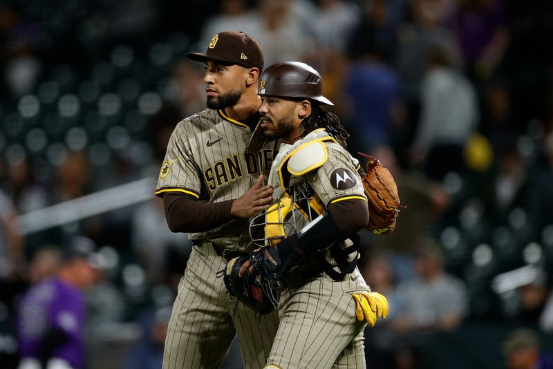 Apr 22, 2024; Denver, Colorado, USA; San Diego Padres relief pitcher Robert Suarez (75) reacts with catcher Luis Campusano (12) after the game against the Colorado Rockies at Coors Field. Mandatory Credit: Isaiah J. Downing-USA TODAY Sports