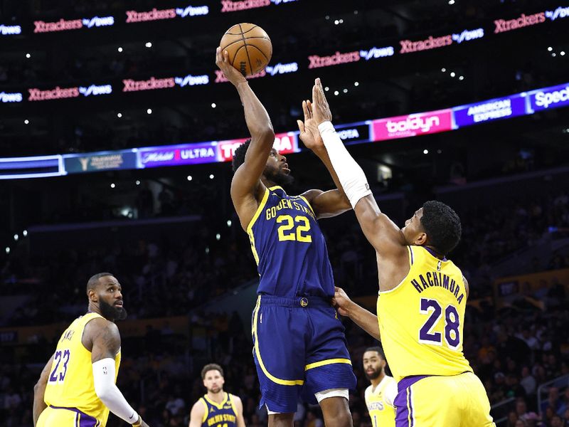LOS ANGELES, CALIFORNIA - APRIL 09:  Andrew Wiggins #22 of the Golden State Warriors takes a shot against Rui Hachimura #28 of the Los Angeles Lakers in the second half at Crypto.com Arena on April 09, 2024 in Los Angeles, California.  NOTE TO USER: User expressly acknowledges and agrees that, by downloading and/or using this photograph, user is consenting to the terms and conditions of the Getty Images License Agreement.  (Photo by Ronald Martinez/Getty Images)