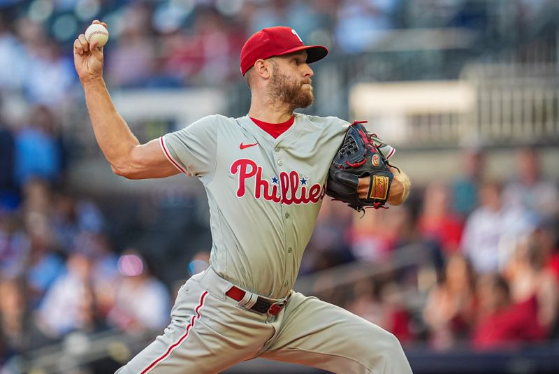 Aug 20, 2024; Cumberland, Georgia, USA; Philadelphia Phillies starting pitcher Zack Wheeler (45) pitches against the Atlanta Braves during the first inning at Truist Park. Mandatory Credit: Dale Zanine-USA TODAY Sports