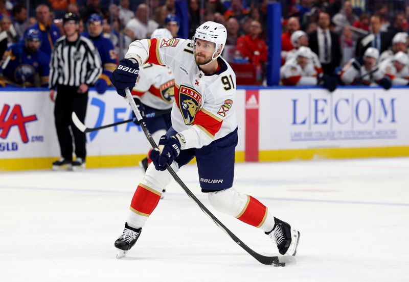 Feb 15, 2024; Buffalo, New York, USA;  Florida Panthers defenseman Oliver Ekman-Larsson (91) takes a shot on goal during the third period against the Buffalo Sabres at KeyBank Center. Mandatory Credit: Timothy T. Ludwig-USA TODAY Sports