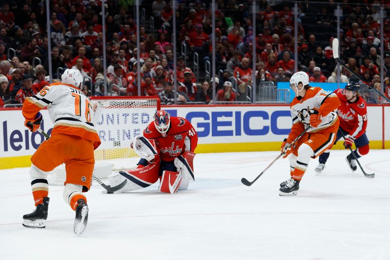 Jan 14, 2025; Washington, District of Columbia, USA; Washington Capitals goaltender Logan Thompson (48) makes a save on Anaheim Ducks center Ryan Strome (16) in the second period at Capital One Arena. Mandatory Credit: Geoff Burke-Imagn Images