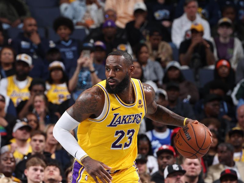 MEMPHIS, TN - MARCH 27: LeBron James #23 of the Los Angeles Lakers dribbles the ball during the game against the Memphis Grizzlies on March 27, 2024 at FedExForum in Memphis, Tennessee. NOTE TO USER: User expressly acknowledges and agrees that, by downloading and or using this photograph, User is consenting to the terms and conditions of the Getty Images License Agreement. Mandatory Copyright Notice: Copyright 2024 NBAE (Photo by Joe Murphy/NBAE via Getty Images)