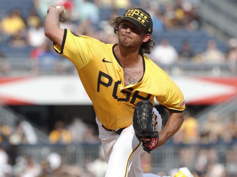 Jun 22, 2024; Pittsburgh, Pennsylvania, USA;  Pittsburgh Pirates starting pitcher Jared Jones (37) pitches against the ray/ during the seventh inning at PNC Park. The Pirates won 4-3. Mandatory Credit: Charles LeClaire-USA TODAY Sports