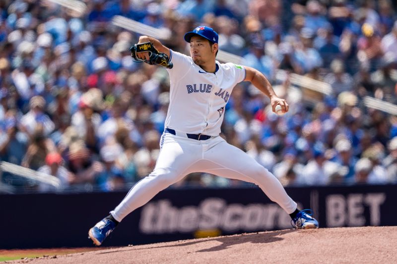 Jul 20, 2024; Toronto, Ontario, CAN; Toronto Blue Jays pitcher Yusei Kikuchi (16) pitches to the Detroit Tigers during the first inning at Rogers Centre. Mandatory Credit: Kevin Sousa-USA TODAY Sports