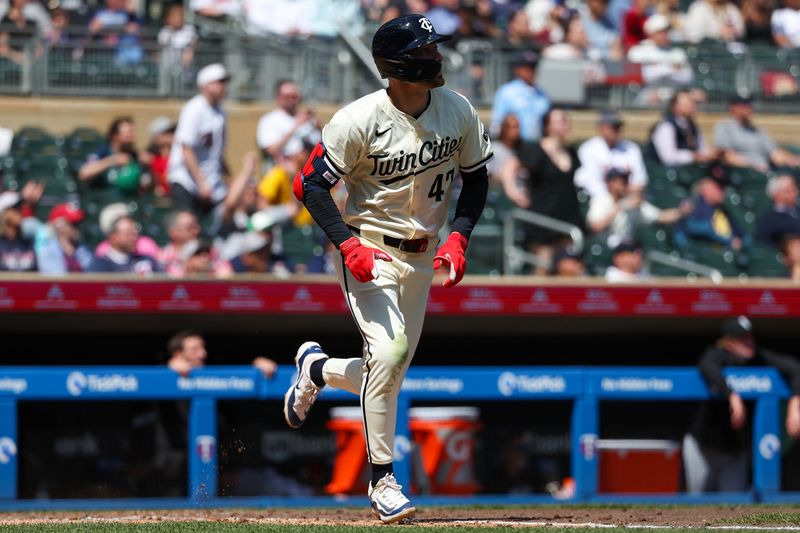 Apr 25, 2024; Minneapolis, Minnesota, USA; Minnesota Twins Edouard Julien (47) hits a solo home run against the Chicago White Sox during the sixth inning at Target Field. Mandatory Credit: Matt Krohn-USA TODAY Sports