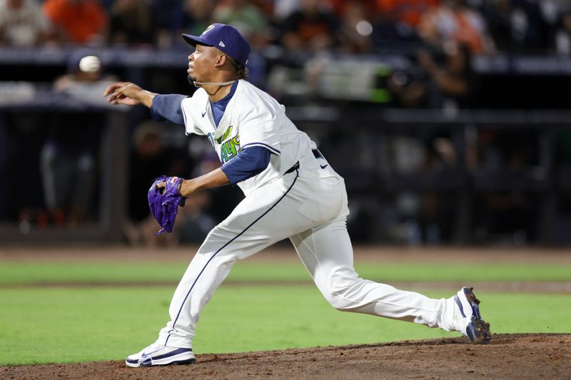 Jul 19, 2025; Tampa, Florida, USA; Tampa Bay Rays pitcher Edwin Uceta (63) throws a pitch against the Baltimore Orioles in the seventh inning at George M. Steinbrenner Field. Mandatory Credit: Nathan Ray Seebeck-Imagn Images