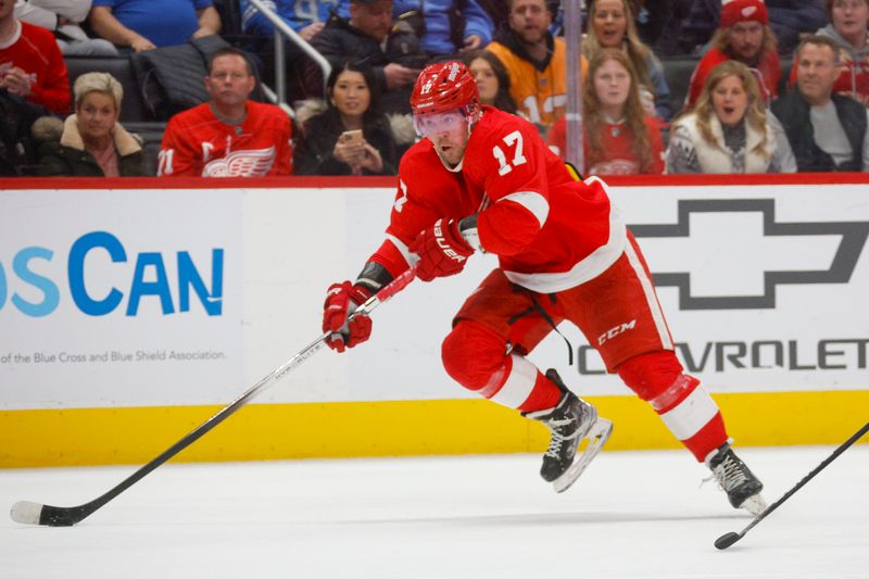 Jan 21, 2024; Detroit, Michigan, USA; Detroit Red Wings right wing Daniel Sprong (17) handles the puck during the second period against the Tampa Bay Lightning at Little Caesars Arena. Mandatory Credit: Brian Bradshaw Sevald-USA TODAY Sports