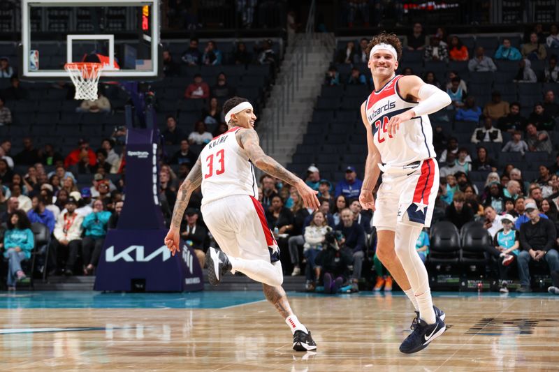 CHARLOTTE, NC - FEBRUARY 3:  Kyle Kuzma #33 of the Washington Wizards celebrates during the game against the Charlotte Hornets on February 3, 2025 at Spectrum Center in Charlotte, North Carolina. NOTE TO USER: User expressly acknowledges and agrees that, by downloading and or using this photograph, User is consenting to the terms and conditions of the Getty Images License Agreement. Mandatory Copyright Notice: Copyright 2025 NBAE (Photo by Stephen Gosling/NBAE via Getty Images) 