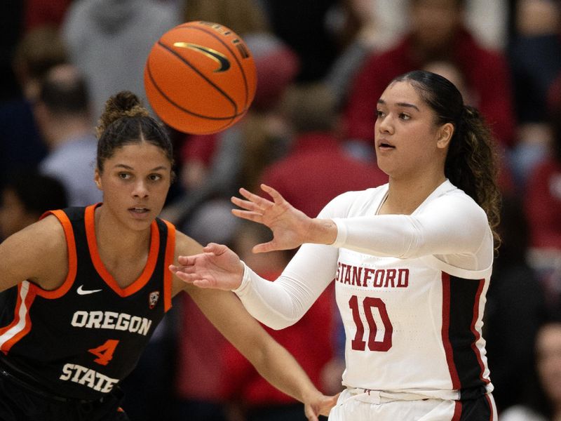 Jan 21, 2024; Stanford, California, USA; Stanford Cardinal guard Talana Lepolo (10) passes against Oregon State Beavers guard Donovyn Hunter (4) during the second quarter at Maples Pavilion. Mandatory Credit: D. Ross Cameron-USA TODAY Sports