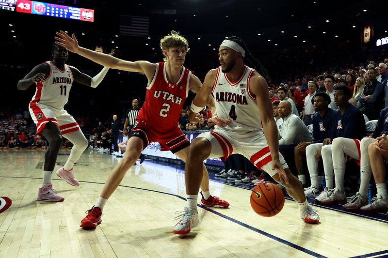 Jan 6, 2024; Tucson, Arizona, USA; Arizona Wildcats guard Kylan Boswell (4) dribbles the ball against Utah Utes guard Cole Bajema (2) during the second half at McKale Center. Mandatory Credit: Zachary BonDurant-USA TODAY Sports