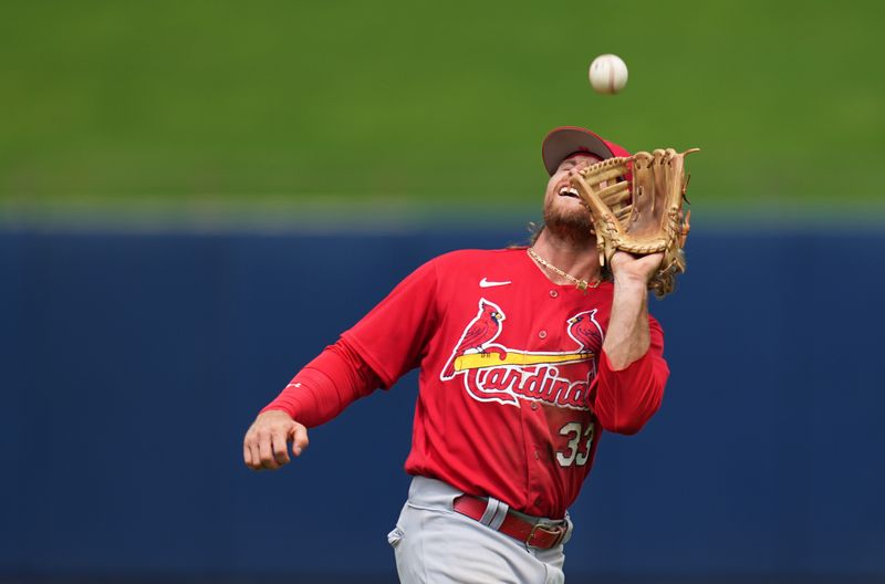 Mar 14, 2023; West Palm Beach, Florida, USA;  St. Louis Cardinals second baseman Brendan Donovan (33) catches a pop fly in the third inning against the Houston Astros at The Ballpark of the Palm Beaches. Mandatory Credit: Jim Rassol-USA TODAY Sports