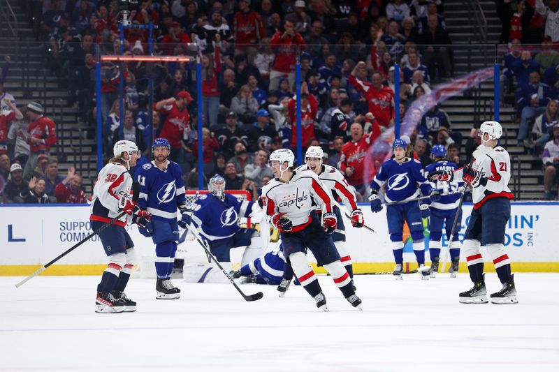 Feb 22, 2024; Tampa, Florida, USA;  Washington Capitals defenseman Rasmus Sandin (38) celebrates after scoring a goal against the Tampa Bay Lightning in the third period at Amalie Arena. Mandatory Credit: Nathan Ray Seebeck-USA TODAY Sports