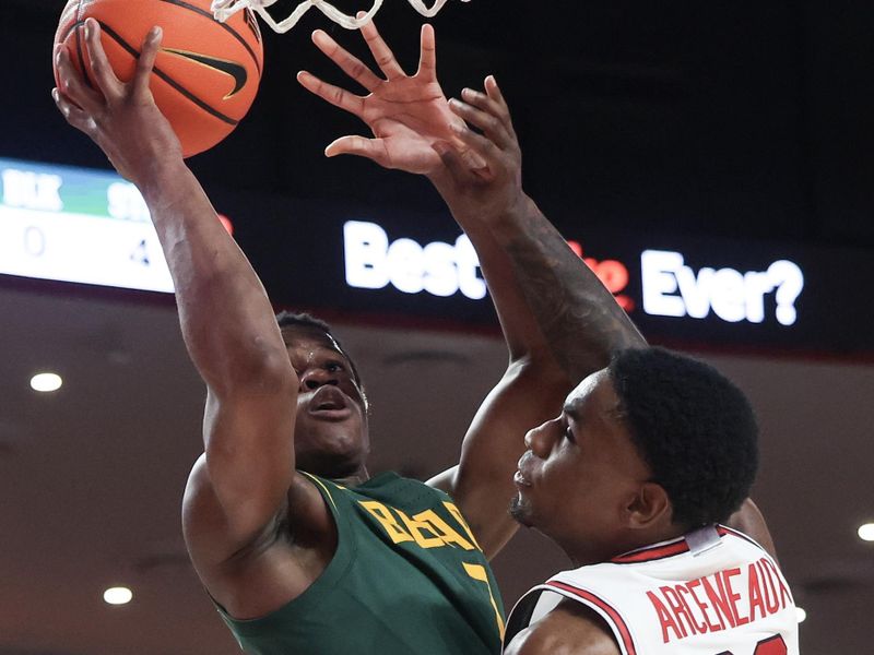 Feb 10, 2025; Houston, Texas, USA; Baylor Bears guard VJ Edgecombe (7) shoots against Houston Cougars guard Terrance Arceneaux (23) in the second half at Fertitta Center. Mandatory Credit: Thomas Shea-Imagn Images