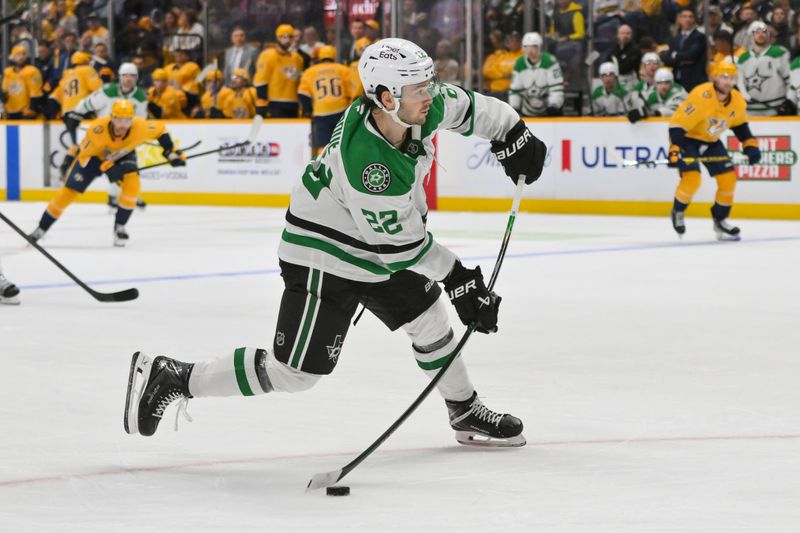 Oct 26, 2025; Nashville, Tennessee, USA;  Dallas Stars center Mavrik Bourque (22) takes a shot on goal against the Nashville Predators during the second period at Bridgestone Arena. Mandatory Credit: Steve Roberts-Imagn Images