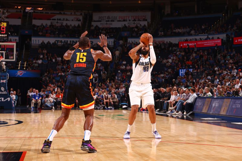 OKLAHOMA CITY, OK - APRIL 14: Markieff Morris #88 of the Dallas Mavericks shoots a three point basket during the game against the Oklahoma City Thunder on April 14, 2024 at Paycom Arena in Oklahoma City, Oklahoma. NOTE TO USER: User expressly acknowledges and agrees that, by downloading and or using this photograph, User is consenting to the terms and conditions of the Getty Images License Agreement. Mandatory Copyright Notice: Copyright 2024 NBAE (Photo by Zach Beeker/NBAE via Getty Images)