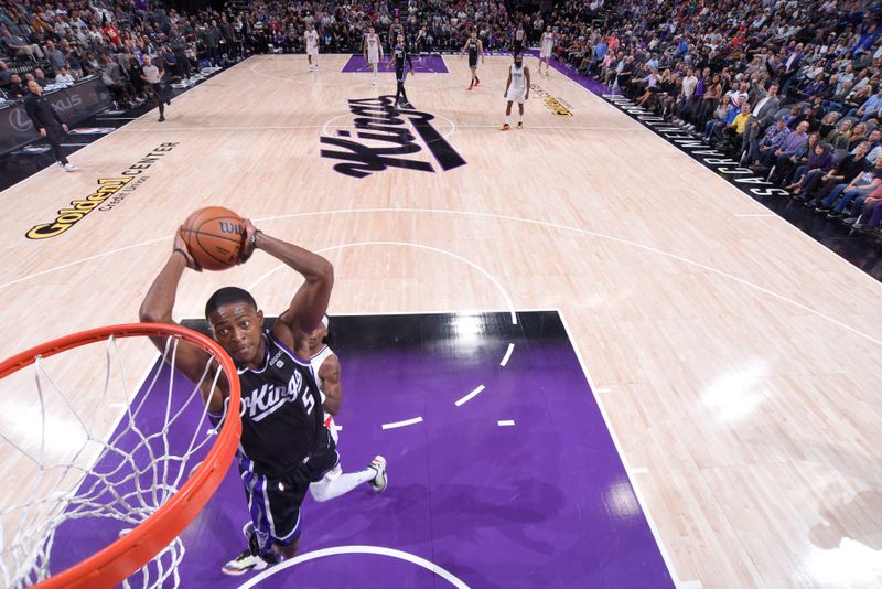 SACRAMENTO, CA - APRIL 2:  De'Aaron Fox #5 of the Sacramento Kings goes to the basket during the game on April 2, 2024 at Golden 1 Center in Sacramento, California. NOTE TO USER: User expressly acknowledges and agrees that, by downloading and or using this Photograph, user is consenting to the terms and conditions of the Getty Images License Agreement. Mandatory Copyright Notice: Copyright 2024 NBAE (Photo by Rocky Widner/NBAE via Getty Images)