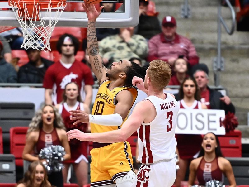 Jan 28, 2023; Pullman, Washington, USA; Arizona State Sun Devils guard Frankie Collins (10) shoots the ball against Washington State Cougars guard Jabe Mullins (3) in the second half at Friel Court at Beasley Coliseum. Washington State won 75-58. Mandatory Credit: James Snook-USA TODAY Sports