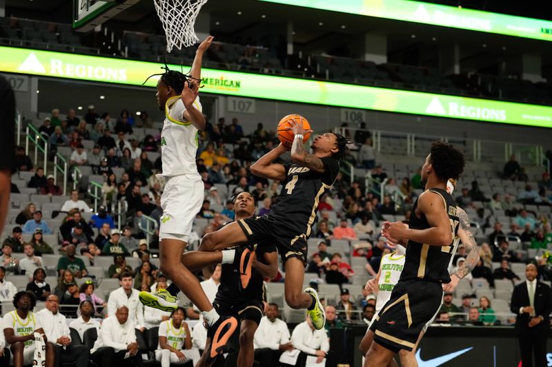 Mar 16, 2024; Fort Worth, TX, USA;  UAB Blazers guard Eric Gaines (4) is fouled while driving to the basket by South Florida Bulls guard Kobe Knox (4) during the first half at Dickies Arena. Mandatory Credit: Chris Jones-USA TODAY Sports