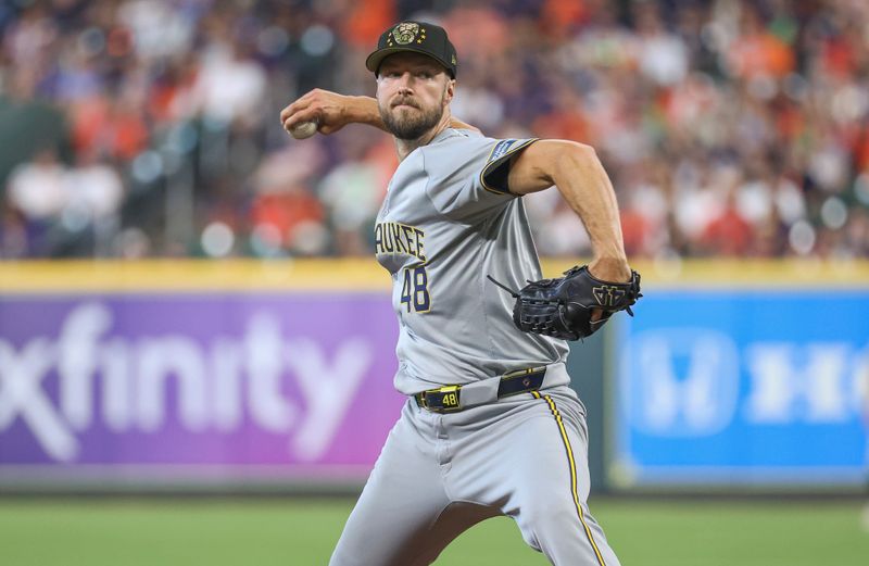 May 19, 2024; Houston, Texas, USA; Milwaukee Brewers starting pitcher Colin Rea (48) delivers a pitch during the second inning against the Houston Astros at Minute Maid Park. Mandatory Credit: Troy Taormina-USA TODAY Sports