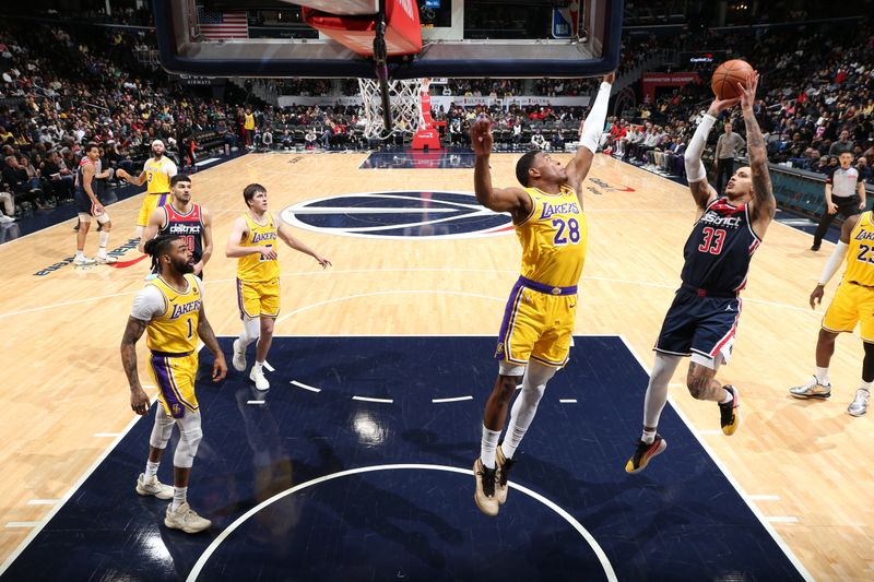 WASHINGTON, DC -? APRIL 3: Kyle Kuzma #33 of the Washington Wizards shoots the ball during the game against the Los Angeles Lakers on April 3, 2024 at Capital One Arena in Washington, DC. NOTE TO USER: User expressly acknowledges and agrees that, by downloading and or using this Photograph, user is consenting to the terms and conditions of the Getty Images License Agreement. Mandatory Copyright Notice: Copyright 2024 NBAE (Photo by Stephen Gosling/NBAE via Getty Images)