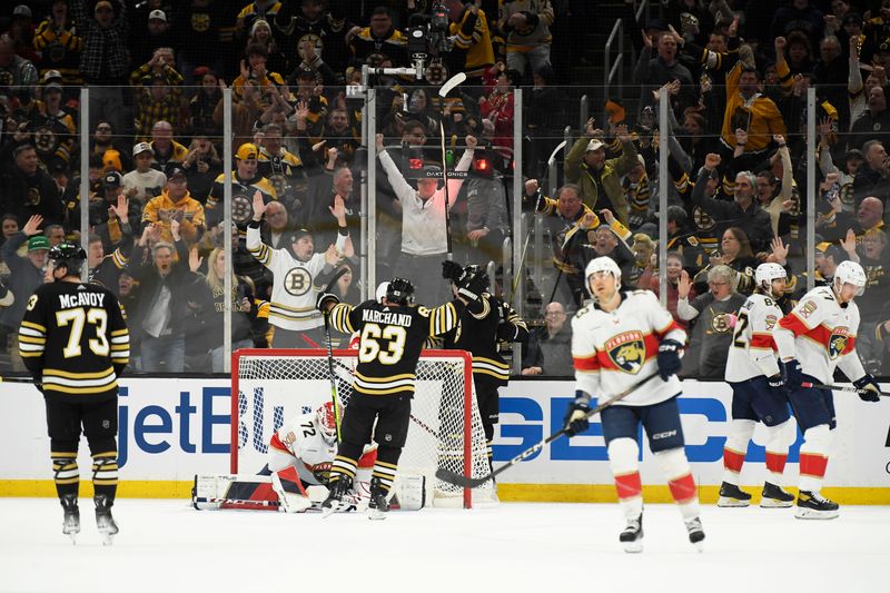 Apr 6, 2024; Boston, Massachusetts, USA; Boston Bruins left wing Brad Marchand (63) celebrates a goal by center Charlie Coyle (13) during the second period against the Florida Panthers at TD Garden. Mandatory Credit: Bob DeChiara-USA TODAY Sports