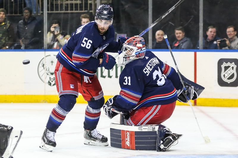 Jan 26, 2024; New York, New York, USA; New York Rangers defenseman Erik Gustafsson (56) and goaltender Igor Shesterkin (31) watch the puck after a deflection in the third period against the Vegas Golden Knights at Madison Square Garden. Mandatory Credit: Wendell Cruz-USA TODAY Sports