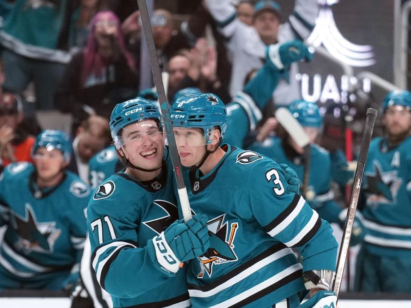 Oct 11, 2025; San Jose, California, USA; San Jose Sharks defenseman John Klingberg (3) celebrates with center Macklin Celebrini (71) after scoring a goal against the Anaheim Ducks d2p/ at SAP Center at San Jose. Mandatory Credit: Darren Yamashita-Imagn Images