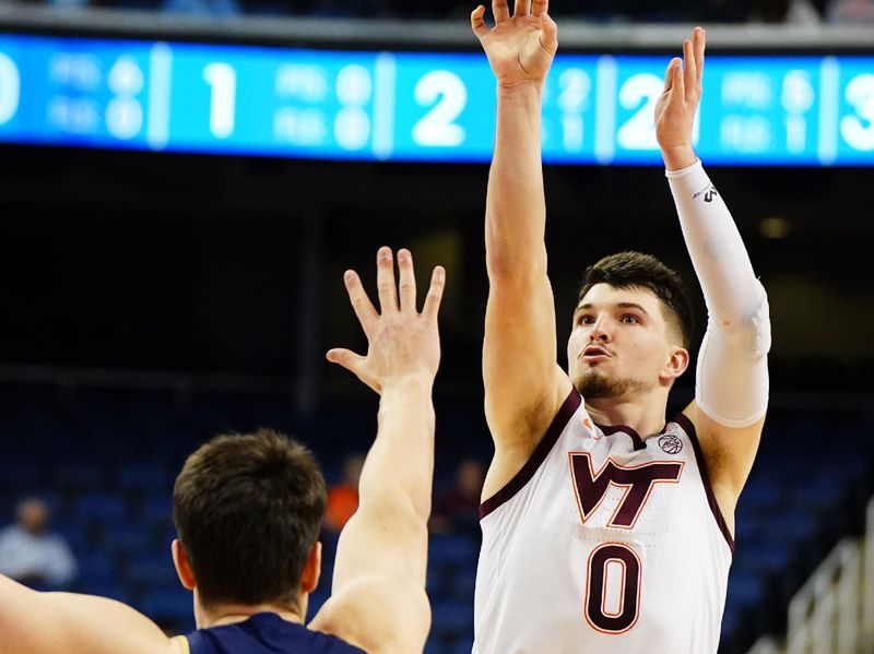 Mar 7, 2023; Greensboro, NC, USA; Virginia Tech Hokies guard Hunter Cattoor (0) takes a jump shot over Notre Dame Fighting Irish forward Matt Zona (25) during the first half of the first round of the ACC tournament at Greensboro Coliseum. Mandatory Credit: John David Mercer-USA TODAY Sports