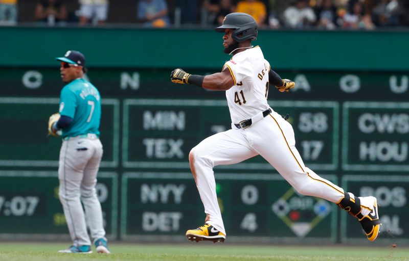 Aug 17, 2024; Pittsburgh, Pennsylvania, USA;  Pittsburgh Pirates left fielder Bryan De La Cruz (41) runs to second base after hitting a single and a Seattle Mariners error during the sixth inning at PNC Park. Mandatory Credit: Charles LeClaire-USA TODAY Sports