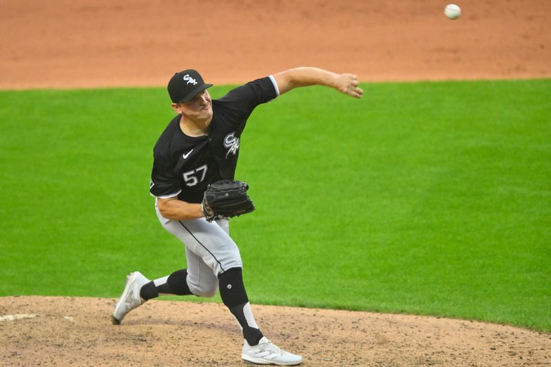 Jul 3, 2024; Cleveland, Ohio, USA; Chicago White Sox relief pitcher Tanner Banks (57) delivers a pitch in the seventh inning against the Cleveland Guardians at Progressive Field. Mandatory Credit: David Richard-USA TODAY Sports