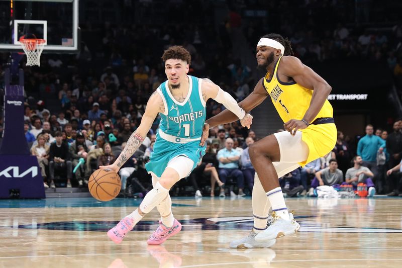 CHARLOTTE, NC - NOVEMBER 8: LaMelo Ball #1 of the Charlotte Hornets drives to the basket during the game against the Indiana Pacers on November 8, 2024 at Spectrum Center in Charlotte, North Carolina. NOTE TO USER: User expressly acknowledges and agrees that, by downloading and or using this photograph, User is consenting to the terms and conditions of the Getty Images License Agreement. Mandatory Copyright Notice: Copyright 2024 NBAE (Photo by Brock Williams-Smith/NBAE via Getty Images)