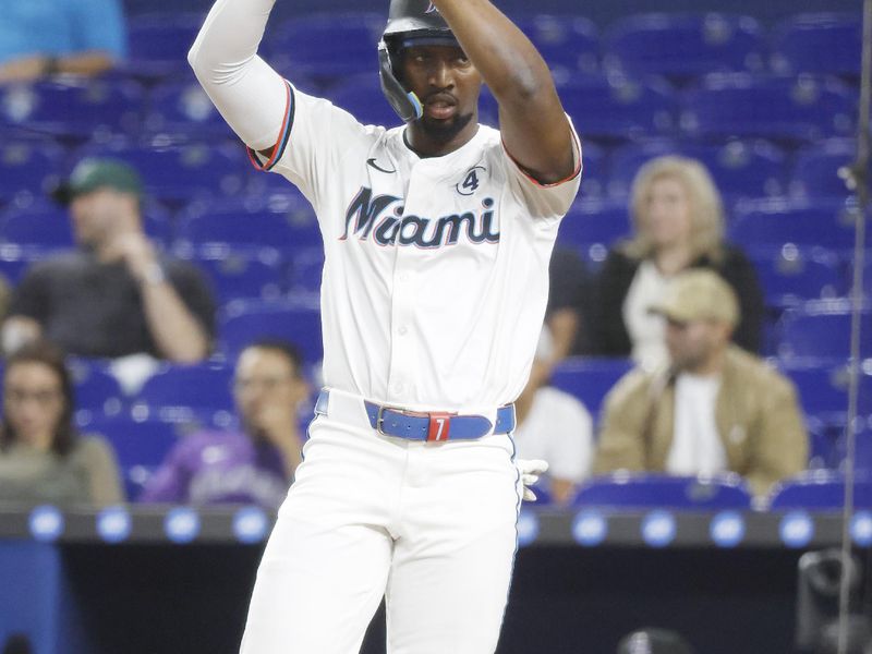 Jun 2, 2025; Miami, Florida, USA;  Miami Marlins right fielder Jesus Sanchez (7) reacts after scoring against the Colorado Rockies during the first inning at loanDepot Park. Mandatory Credit: Rhona Wise-Imagn Images
