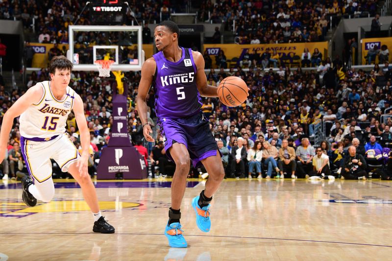 LOS ANGELES, CA - OCTOBER 26: De'Aaron Fox #5 of the Sacramento Kings dribbles the ball during the game against the Los Angeles Lakers on October 26, 2024 at Crypto.Com Arena in Los Angeles, California. NOTE TO USER: User expressly acknowledges and agrees that, by downloading and/or using this Photograph, user is consenting to the terms and conditions of the Getty Images License Agreement. Mandatory Copyright Notice: Copyright 2024 NBAE (Photo by Adam Pantozzi/NBAE via Getty Images)