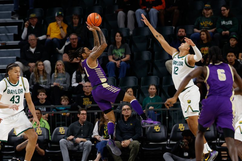 Dec 19, 2025; Waco, Texas, USA;  Alcorn State Braves guard Jameel Morris (1) shoots against Baylor Bears guard Michael Rataj (12) during the first half at Paul and Alejandra Foster Pavilion. Mandatory Credit: Chris Jones-Imagn Images