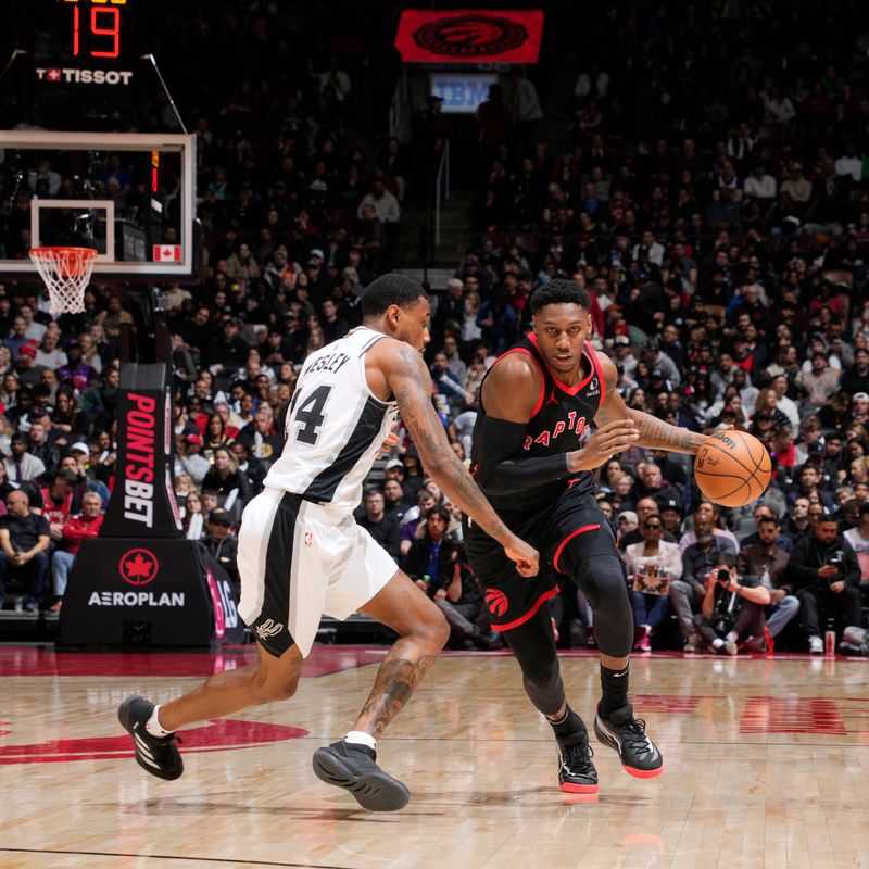 TORONTO, CANADA - MARCH 23:  RJ Barrett #9 of the Toronto Raptors shoots the ball during the game against the San Antonio Spurs on March 23, 2025 at the Scotiabank Arena in Toronto, Ontario, Canada.  NOTE TO USER: User expressly acknowledges and agrees that, by downloading and or using this Photograph, user is consenting to the terms and conditions of the Getty Images License Agreement.  Mandatory Copyright Notice: Copyright 2025 NBAE (Photo by Mark Blinch/NBAE via Getty Images)