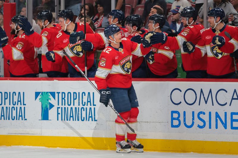 Apr 8, 2025; Sunrise, Florida, USA; Florida Panthers defenseman Gustav Forsling (42) celebrates with teammates after scoring against the Toronto Maple Leafs during the first period at Amerant Bank Arena. Mandatory Credit: Sam Navarro-Imagn Images