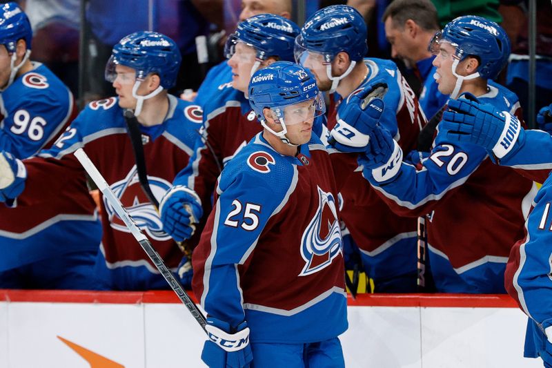 Oct 19, 2023; Denver, Colorado, USA; Colorado Avalanche right wing Logan O'Connor (25) celebrates with the bench after his goal in the first period against the Chicago Blackhawks at Ball Arena. Mandatory Credit: Isaiah J. Downing-USA TODAY Sports