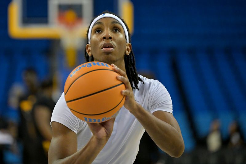 Dec 17, 2025; Los Angeles, California, USA;  UCLA Bruins forward Steven Jamerson II (24) warms up prior to the game against the Arizona State Sun Devils at Pauley Pavilion presented by Wescom Financial. Mandatory Credit: Jayne Kamin-Oncea-Imagn Images 
