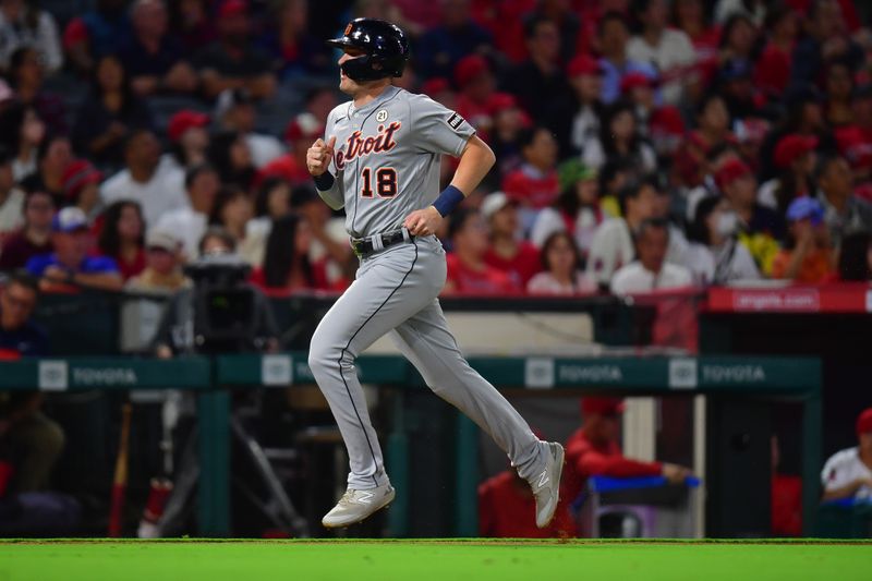 Sep 15, 2023; Anaheim, California, USA; Detroit Tigers pinch runner Tyler Nevin (18) runs home to score against the Los Angeles Angels during the eighth inning at Angel Stadium. Mandatory Credit: Gary A. Vasquez-USA TODAY Sports