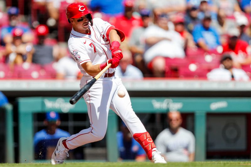 Sep 1, 2023; Cincinnati, Ohio, USA; Cincinnati Reds second baseman Spencer Steer (7) hits a single against the Chicago Cubs in the first inning at Great American Ball Park. Mandatory Credit: Katie Stratman-USA TODAY Sports